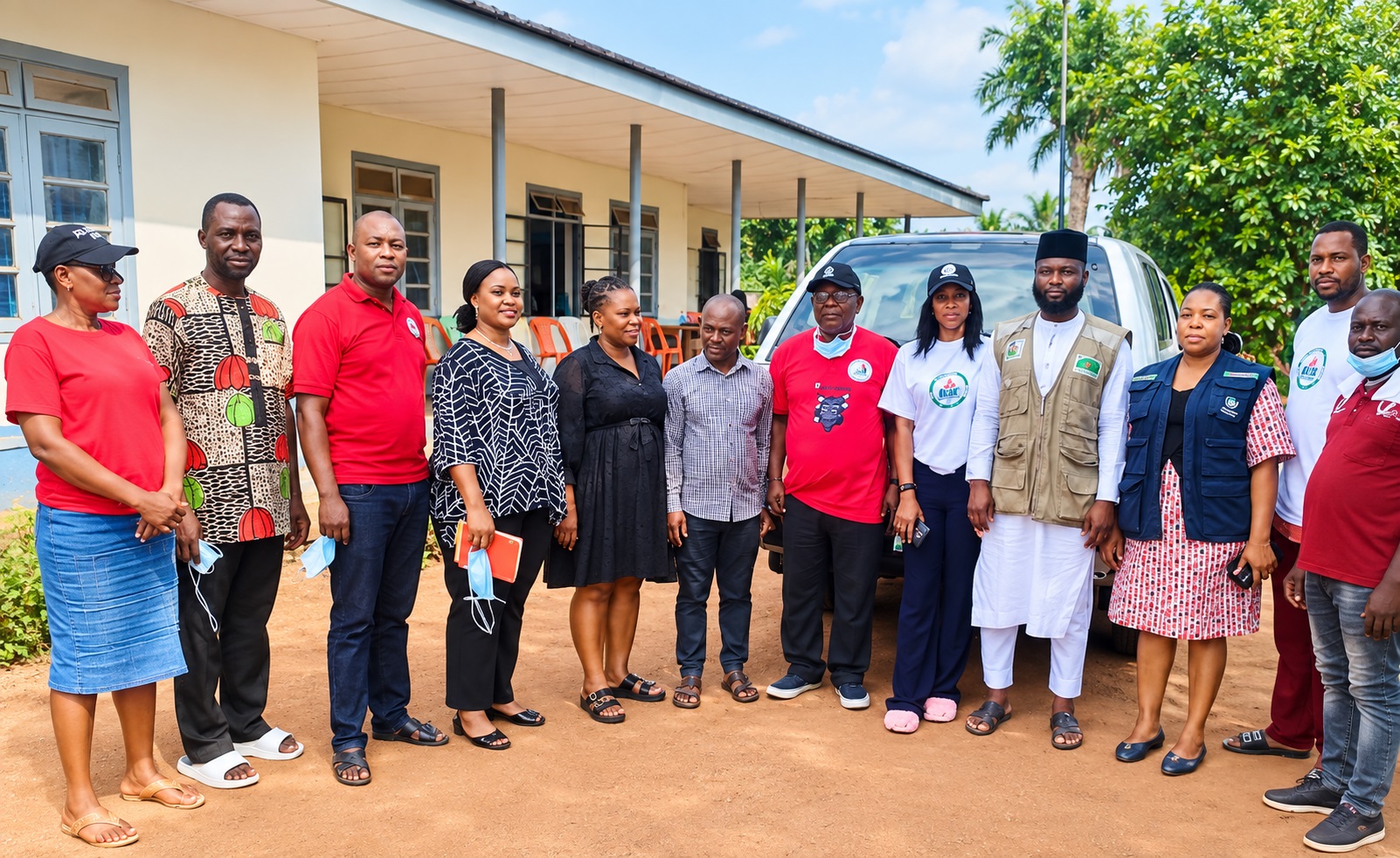 WYDIF officials with health partners and community health workers
